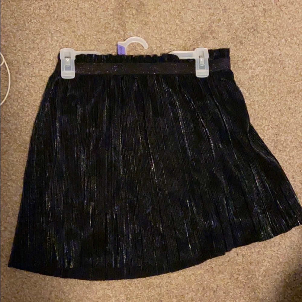 13/ 20 year old shiny beautiful black skirt